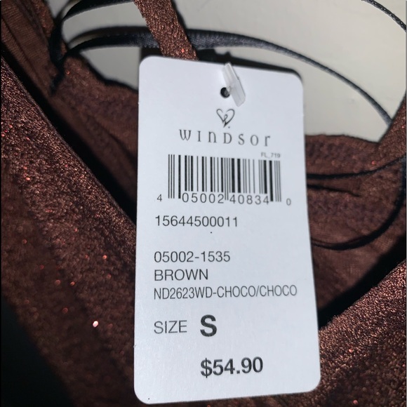 This is a brown/burgundy colored dress that has no holes or tears. So pretty! - Picture 4 of 5